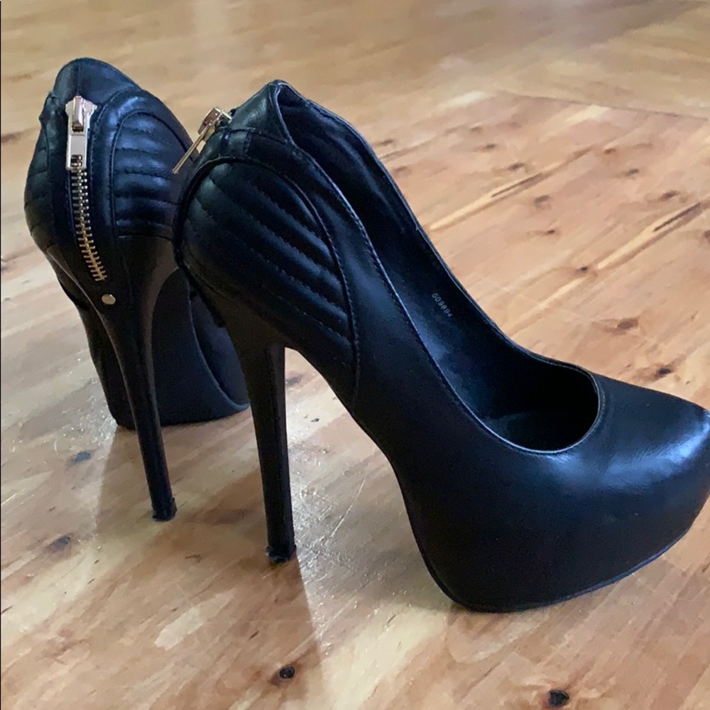 Sexy black zippered high heels size 7.5